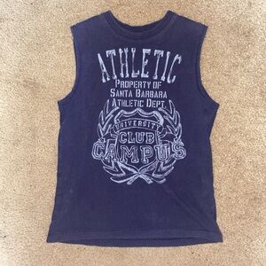 Navy blue sleeveless top with a graphic on the front